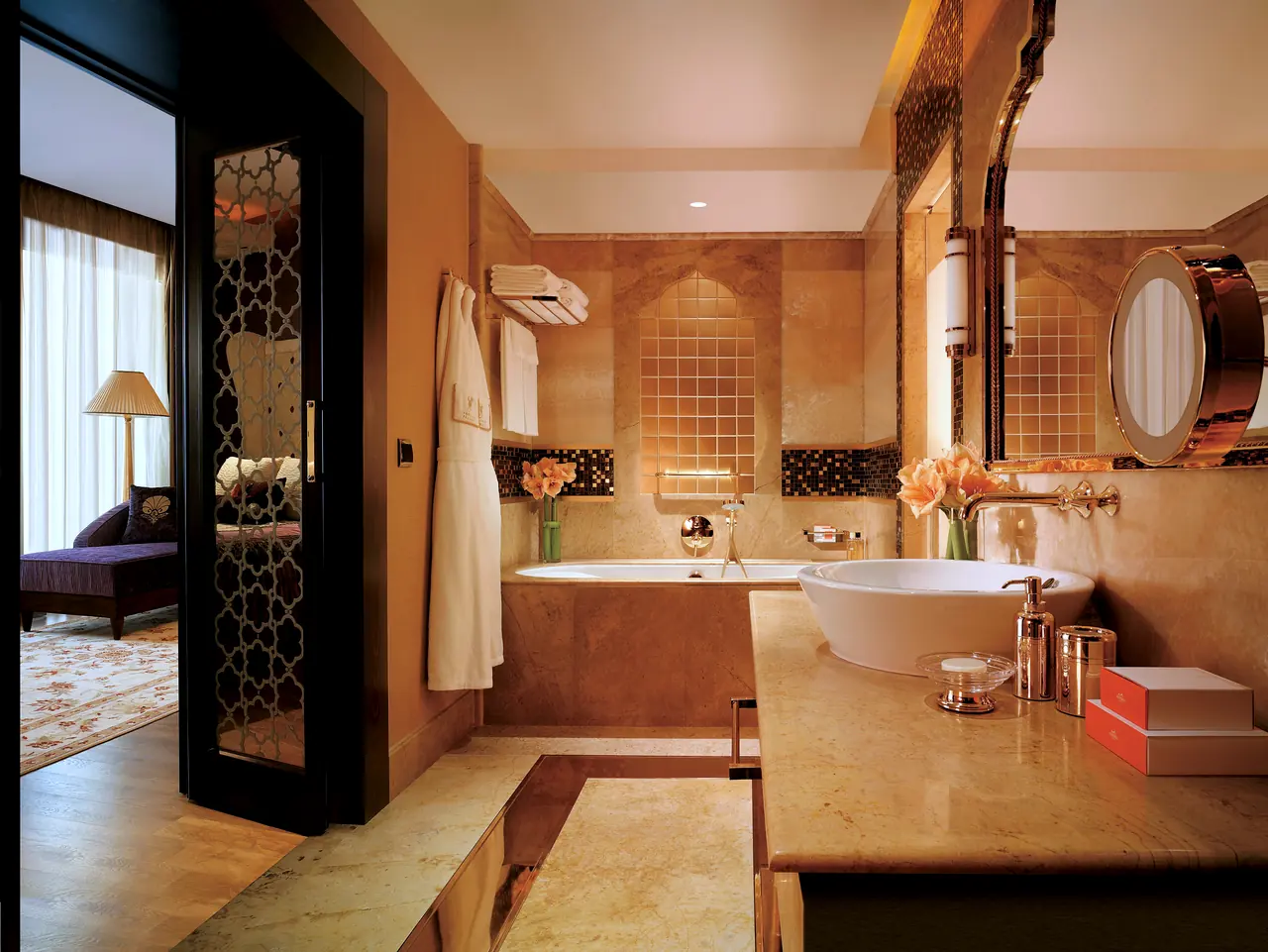 Mardan Palace — Bathroom with bath, basin and door to the bedroom